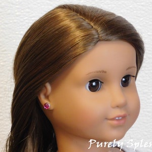 18 inch doll shown wearing a pair of Fuchsia 2mm Studs