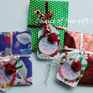 Choice of free gift wrap Lovely Floral or Red paper