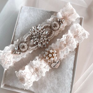 Glamorous Bridal Garter Set with You&#39;re Next Charm / Pearl & Crystal Detail / Non Slip Lace Garters / Vintage Wedding Garter Set
