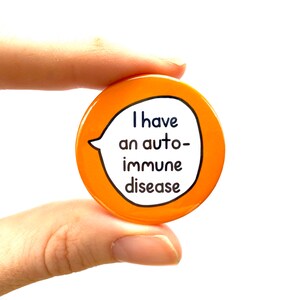 May include: Orange button with a white speech bubble that says "I have an auto-immune disease".