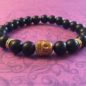 Buddha bracelet, matte black onyx beaded bracelet, gold tone lucky Buddha, spiritual jewelry, wealth, gifts, unisex