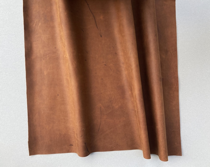 Full Grain 1.3 mm thick Leather.  Scratched and rubbed areas.  Perfect for Projects, Art Crafts and Hobby.