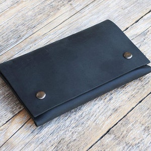 Custodia in pelle nera per Microsoft Surface Duo 2, Duo. Copertura con tasche per carte di credito.