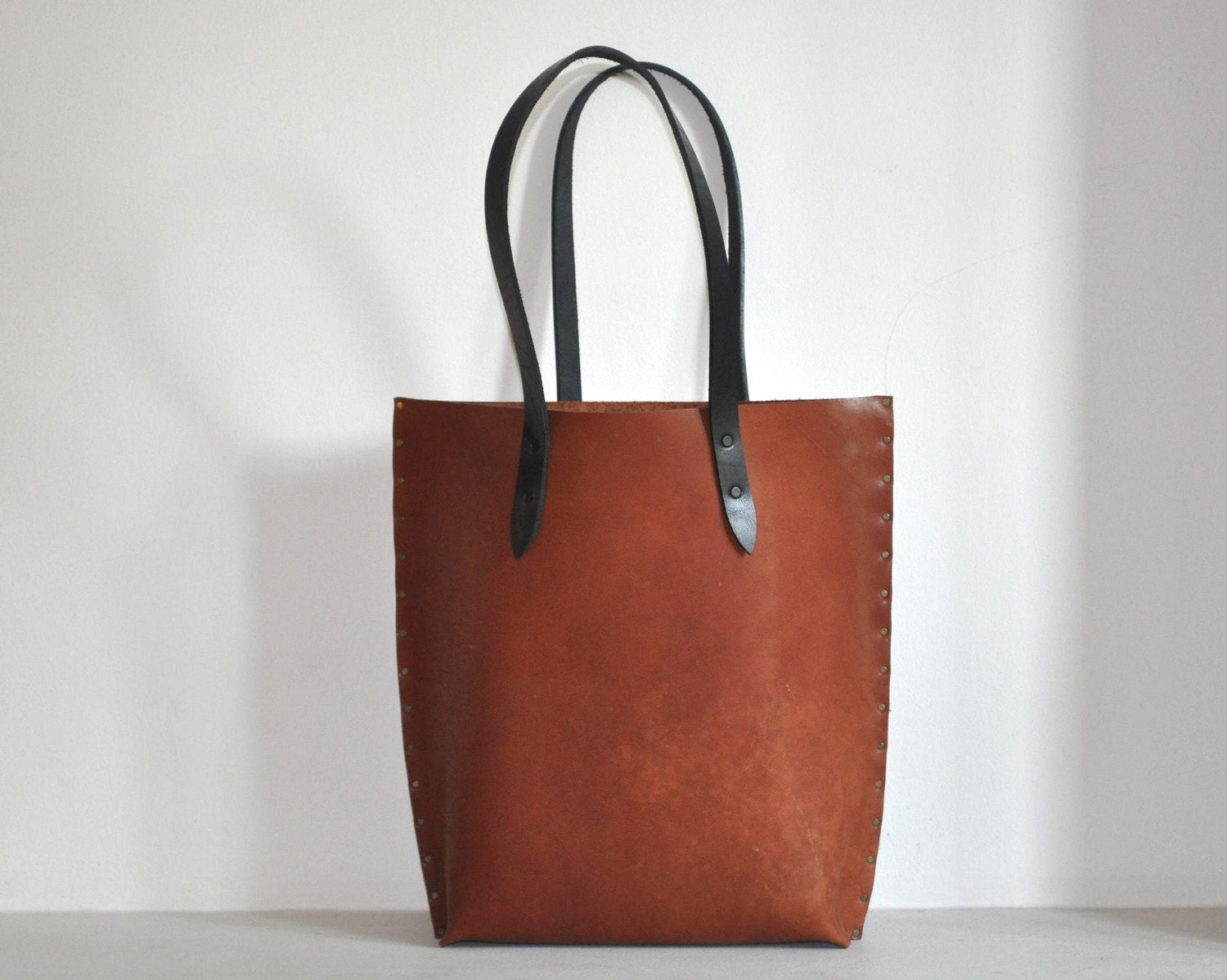 Rough style Unisex Leather Tote. Reddish Brown Bag with Black Straps.