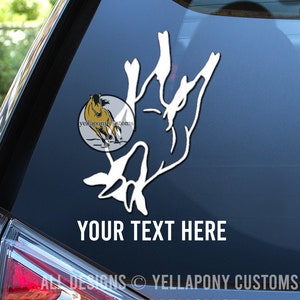 May include: White vinyl decal of a horse bucking with the text "YOUR TEXT HERE" below. The decal is on a blue car window. The decal also includes a small circle with a yellow horse and the text "yellapony customs".