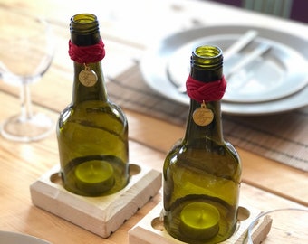 Wine Bottle Hurricane/Storm Lantern. Pair of green glass lanterns with red cord.