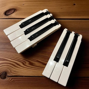 What wood is used for black piano keys?