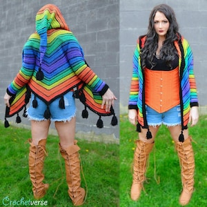 May include: A rainbow striped crochet hooded cardigan with black tassels. The cardigan is worn over a black top and blue denim shorts.