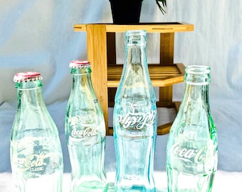 Vintage Turquoise Glass CocaCola Hobble-Skirt Bottles including Hebrew Logo