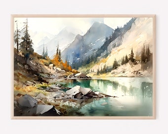 May include: A framed watercolor painting depicting a mountain lake scene with jagged peaks, evergreen trees, and rocky shores. The water reflects the surrounding landscape in shades of teal and blue, with warm golden highlights on the slopes.
