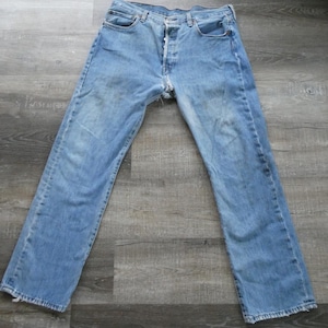 Vintage 1990s Levi&#39;s 501 Jeans: Faded Distressed Denim, Button Fly (35x31)