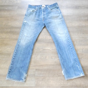 Vintage Levi&#39;s 501 Jeans: Distressed Button Fly Denim (35x31)