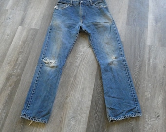 Vintage Levi's 505 Jeans: Distressed Faded Denim, 34x33