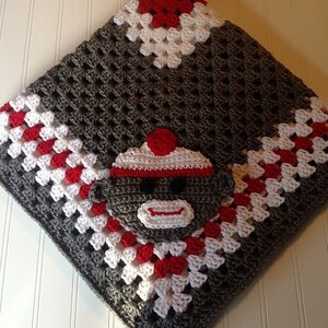 Adorable Crochet Granny Square Blanket for Sock Monkey Fans