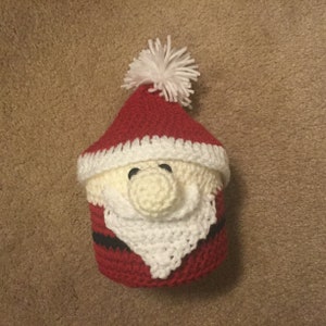 Buon Natale!  Adorabile coperchio del rotolo di carta igienica di Babbo Natale