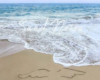 Wings drawn on the beach, angel, angel baby, child loss, stillborn, celebration of life, hawaii, beach, pink sunset, sandwriting, digital