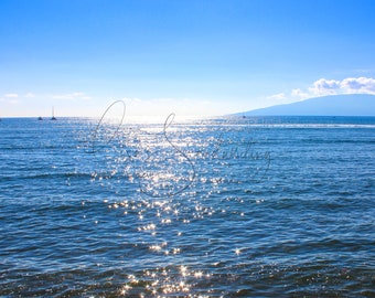 Lahaina, Maui, Hawaii, sun sparkling onto the rich blue water. Proceeds from purchase will go to the Maui Humane Soc, daytime ocean photo.