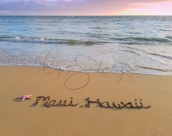 Maui Hawaii written in the sand in Kihei, beautiful pink purple sunset, pink starfish on the sand, digital.