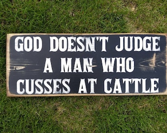 Cattle sign, God Doesn't Judge a man who cusses cattle, cows, funny Rustic Ranch sign, working cattle, western humor, Rancher husband gifts