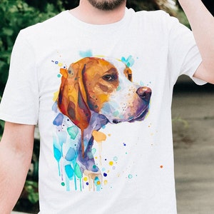 May include: White t-shirt with a watercolor illustration of a brown and white dog with blue, green, and yellow paint splatters.