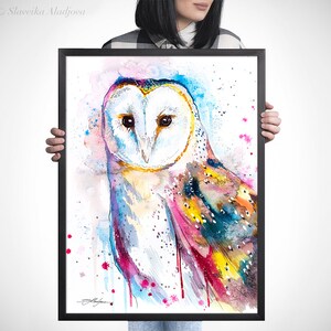 May include: A watercolor painting of a barn owl with colorful feathers and a white face. The owl is painted in shades of blue, pink, yellow, and green. The background is white with pink and blue watercolor splatters.