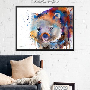 May include: Watercolor painting of a wombat with a blue, orange, and yellow background. The wombat is looking directly at the viewer with a curious expression.