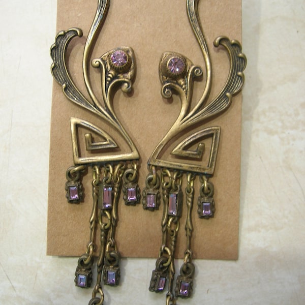 unusual Rare Banana Bob pierced earrings with pale purple stones