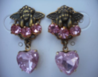 Brass pierced angel earrings with pink stones