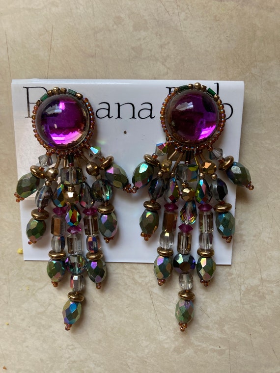 Banana Bob earrings clip chandelier with purple cabochons AB beads