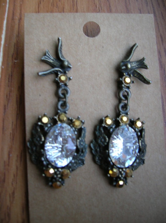 Banana bob bronze pierced bird earrings