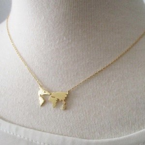 Wereldkaartketting, wereldbolketting. Gouden, roségouden of zilveren wereldketting, reiscadeau