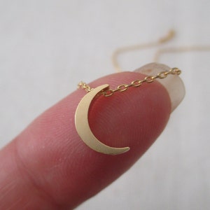 Tiny Gold or Silver Crescent moon necklace.... dainty and delicate, birthday, wedding, bridesmaid gift