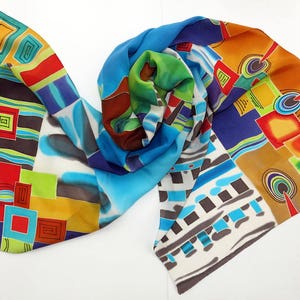 silk scarf on Hundertwasser motives. Hand painted silk scarf in red, green, blue painted silk. Batik scarf silk painting