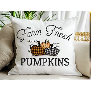 18x18 inch canvas pillow cover hidden zipper reads farm fresh pumpkins with 3 pumpkins on it two of them are buffalo plaid image is permanently embedded into the fibers of the fabric and will never come off machine wash tumble dry pillow cover only