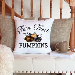 18x18 inch canvas pillow cover hidden zipper reads farm fresh pumpkins with 3 pumpkins on it two of them are buffalo plaid image is permanently embedded into the fibers of the fabric and will never come off machine wash tumble dry pillow cover only