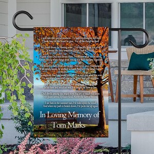 May include: A garden flag with a fall-themed background and a poem about a father. The poem reads "In Loving Memory of Tom Marks".