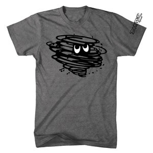May include: A heather gray t-shirt featuring a black cartoon tornado design with white eyes. The shirt has short sleeves and a crew neck. The text "Duster Plymouth" is printed on the right sleeve.