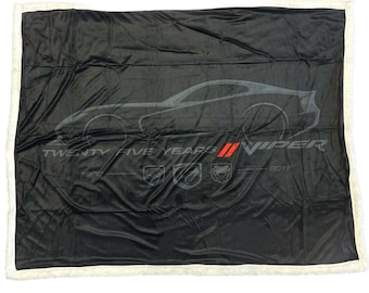 May include: Black fleece throw blanket featuring a grey outline of a Dodge Viper and the text "Twenty Five Years Viper 1992 - 2017".