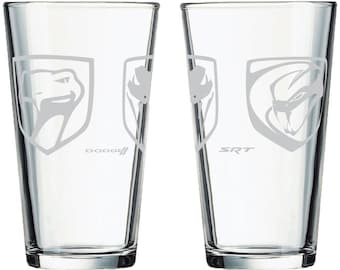 May include: Two clear glass pint glasses, one with the Dodge Viper logo and the other with the SRT logo.