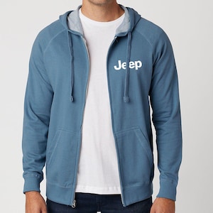 May include: A blue zippered hoodie with a white Jeep logo on the front.