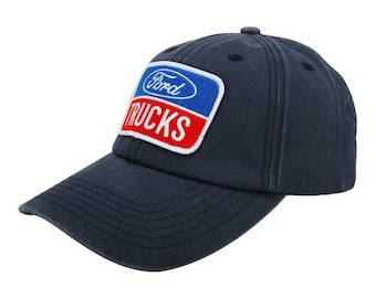 May include: A navy blue baseball cap with a white, red, and blue embroidered patch that says "Ford Trucks".