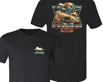 May include: Black t-shirt with a green Jeep logo on the front and a graphic of a Jeep driving through a mountain landscape on the back. The graphic includes the text "Let the adventure begin".