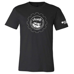May include: Black t-shirt with a white Jeep Performance Parts logo. The logo features a gear with the Jeep logo inside and the words "Performance Parts" around the gear.