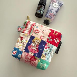 Hand quilted mini pouch