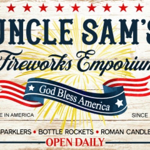 May include: A vintage-style sign for Uncle Sam's Fireworks Emporium, featuring a red, white, and blue ribbon with stars and the text "God Bless America". The sign also includes the text "Made in America" and "Since 1776".