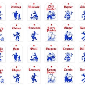 May include: A collection of white spice labels with red text and blue illustrations. Each label features a different spice name, such as "Salt," "Nutmeg," and "Mustard." The labels have a decorative design with a diamond at the top.