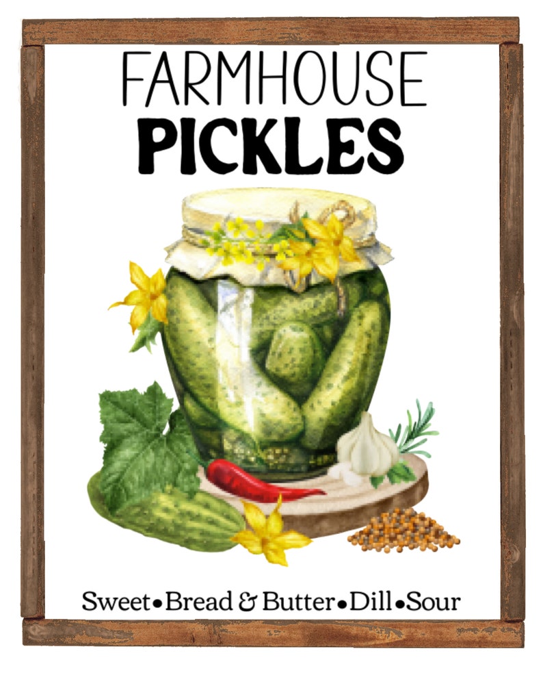 May include: A framed watercolor illustration of a jar of pickles with a white background. The jar is decorated with yellow flowers and a white cloth. The text "FARMHOUSE PICKLES" is at the top of the image. The text "Sweet Bread & Butter Dill Sour" is at the bottom of the image.