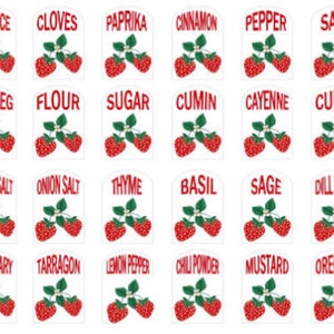 May include: Twenty-four white labels with red text and a graphic of two red strawberries with green leaves. The labels are for spices and herbs, including allspice, cloves, paprika, cinnamon, pepper, salt, nutmeg, flour, sugar, cumin, cayenne, curry, garlic salt, onion salt, thyme, basil, sage, dill weed, rosemary, tarragon, lemon pepper, chili powder, mustard, and oregano.