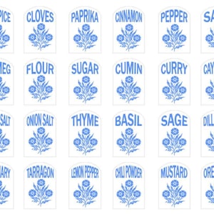 May include: A collection of 24 white spice jar labels with blue text and floral designs. Each label is arched at the top and features a different spice name, including "Allspice," "Cinnamon," and "Oregano."