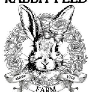 May include: Black and white illustration of a rabbit with a wreath of roses around its head. The text "RABBIT FEED FARM" and "Since 1912" are on a banner below the rabbit. The text "Mama Bunny Approved" is below the banner.